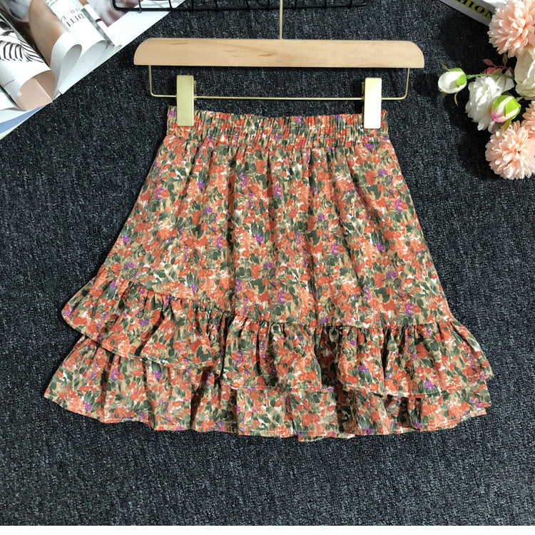 Modischer Damenrock mit Gänseblümchen-Muster und Lotusblatt-Design
