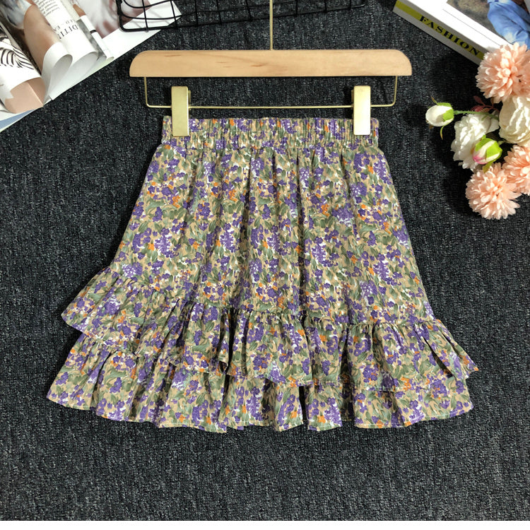 Modischer Damenrock mit Gänseblümchen-Muster und Lotusblatt-Design