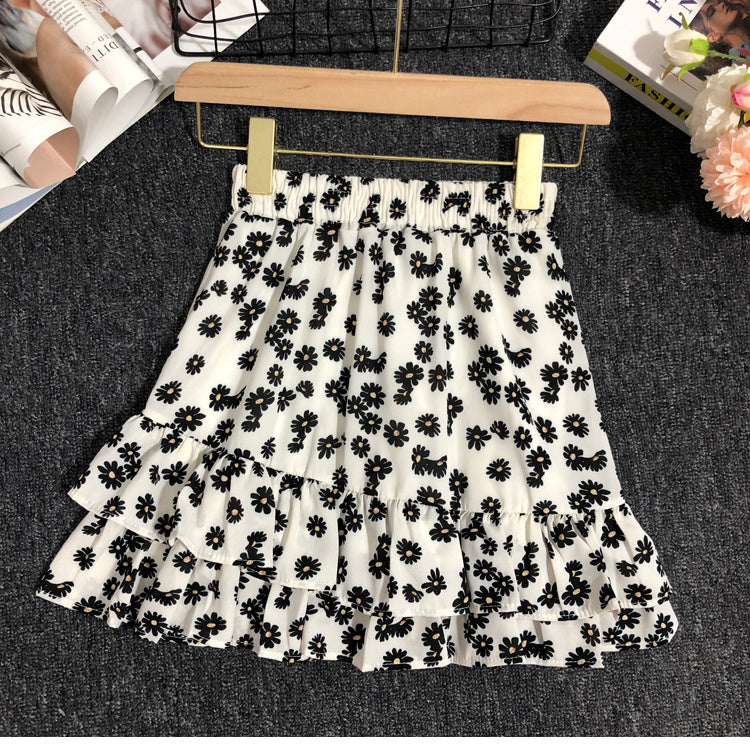 Modischer Damenrock mit Gänseblümchen-Muster und Lotusblatt-Design
