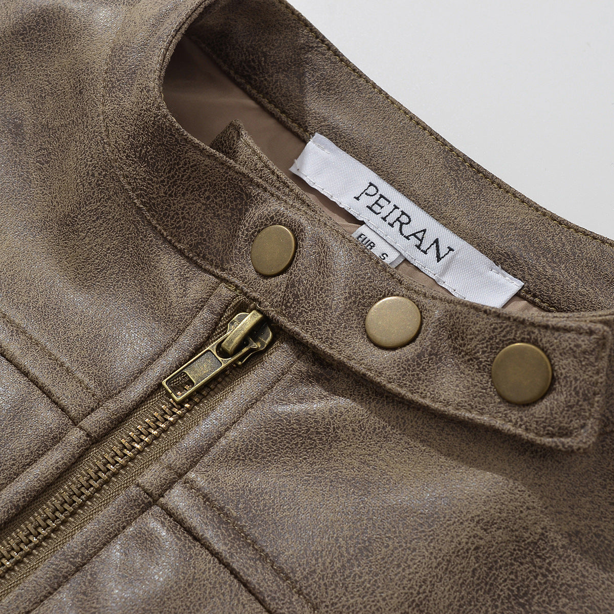 Retro short jacket for women with a narrow stand-up collar made of faux suede