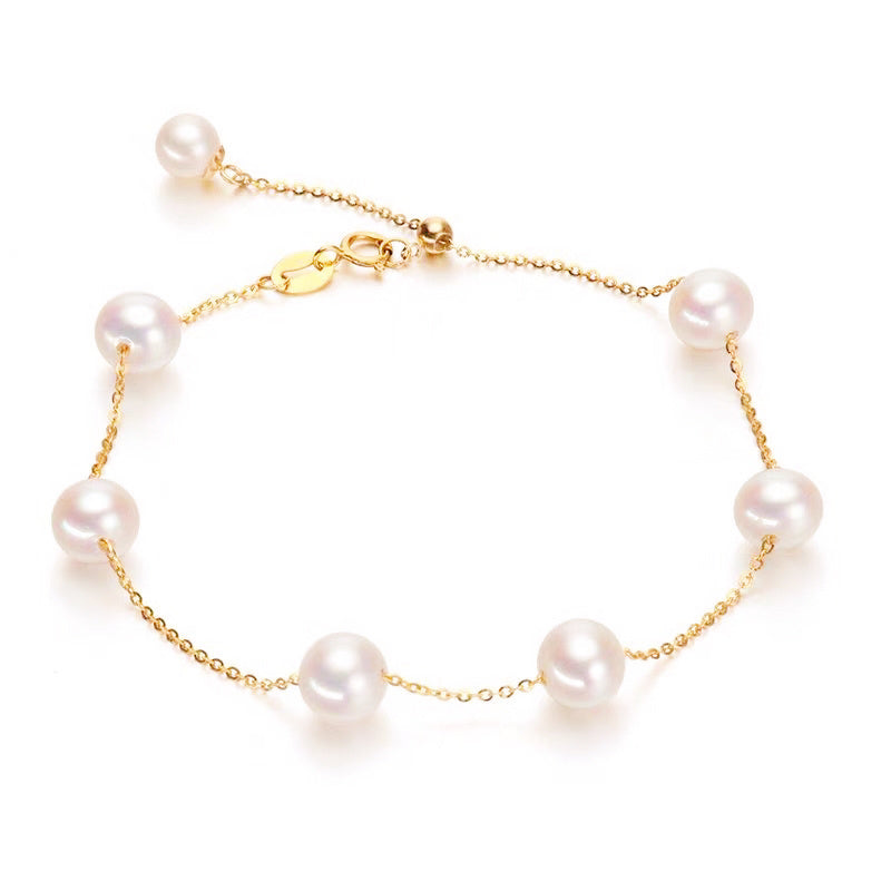 Pulsera de perlas de oro de 18 quilates: elegancia y lujo atemporales 