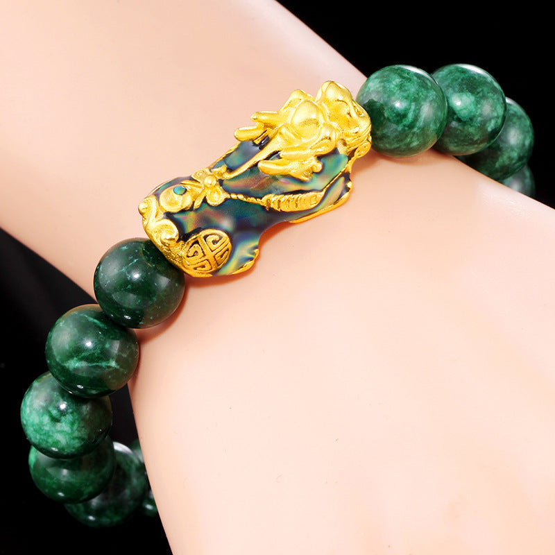 Pulsera camaleón oro arena