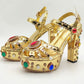 Goldene Barock High Heel Sandaletten mit Spiegelglanz