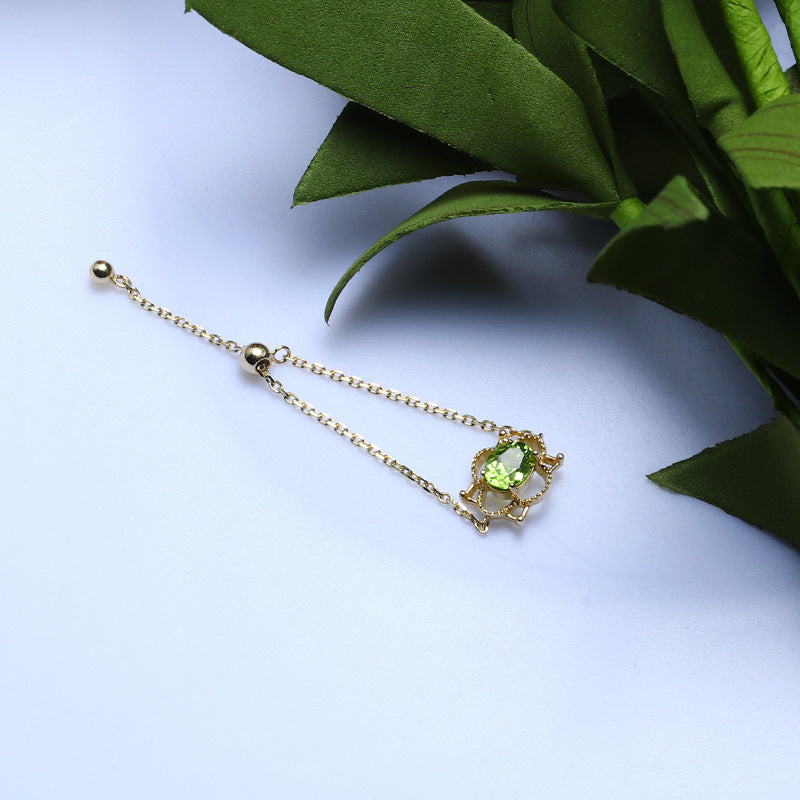 9K Gold Adjustable Chain Ring with Natural Peridot – Elegance in Green