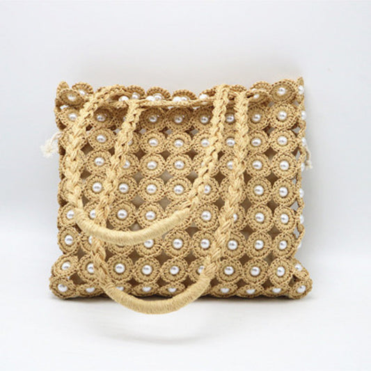 Elegant ladies woven handbag with pearl detail – stylish design for every occasion
