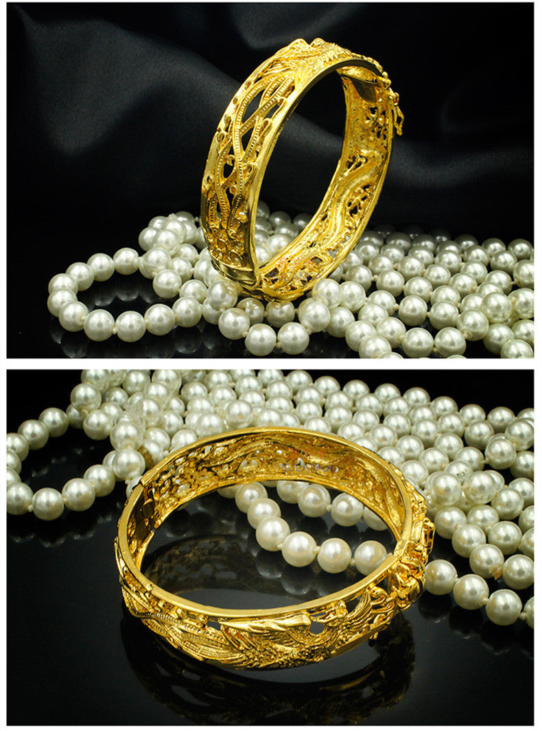 Gold-plated bracelet with dragon and phoenix design - elegance for weddings and special occasions 