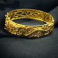 Gold-plated bracelet with dragon and phoenix design - elegance for weddings and special occasions 