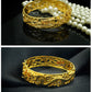 Gold-plated bracelet with dragon and phoenix design - elegance for weddings and special occasions 