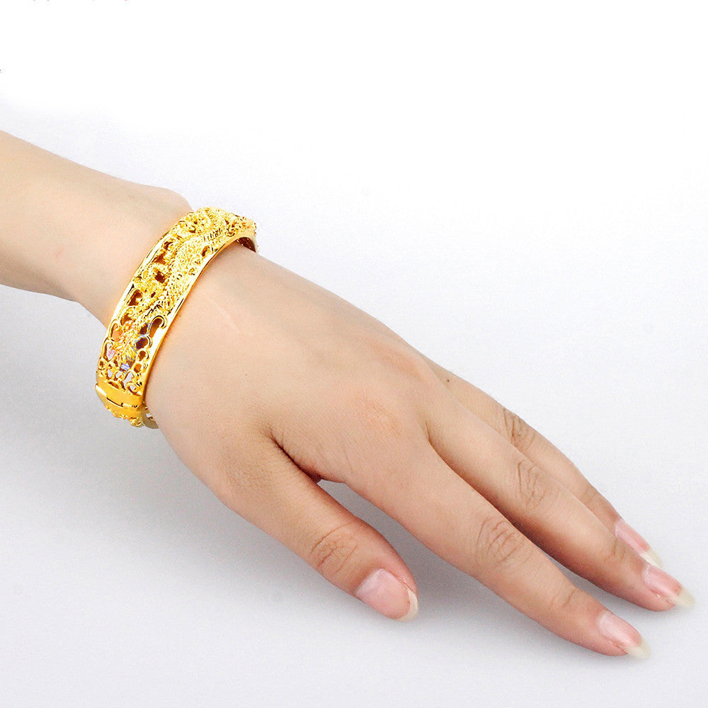 Gold-plated bracelet with dragon and phoenix design - elegance for weddings and special occasions 