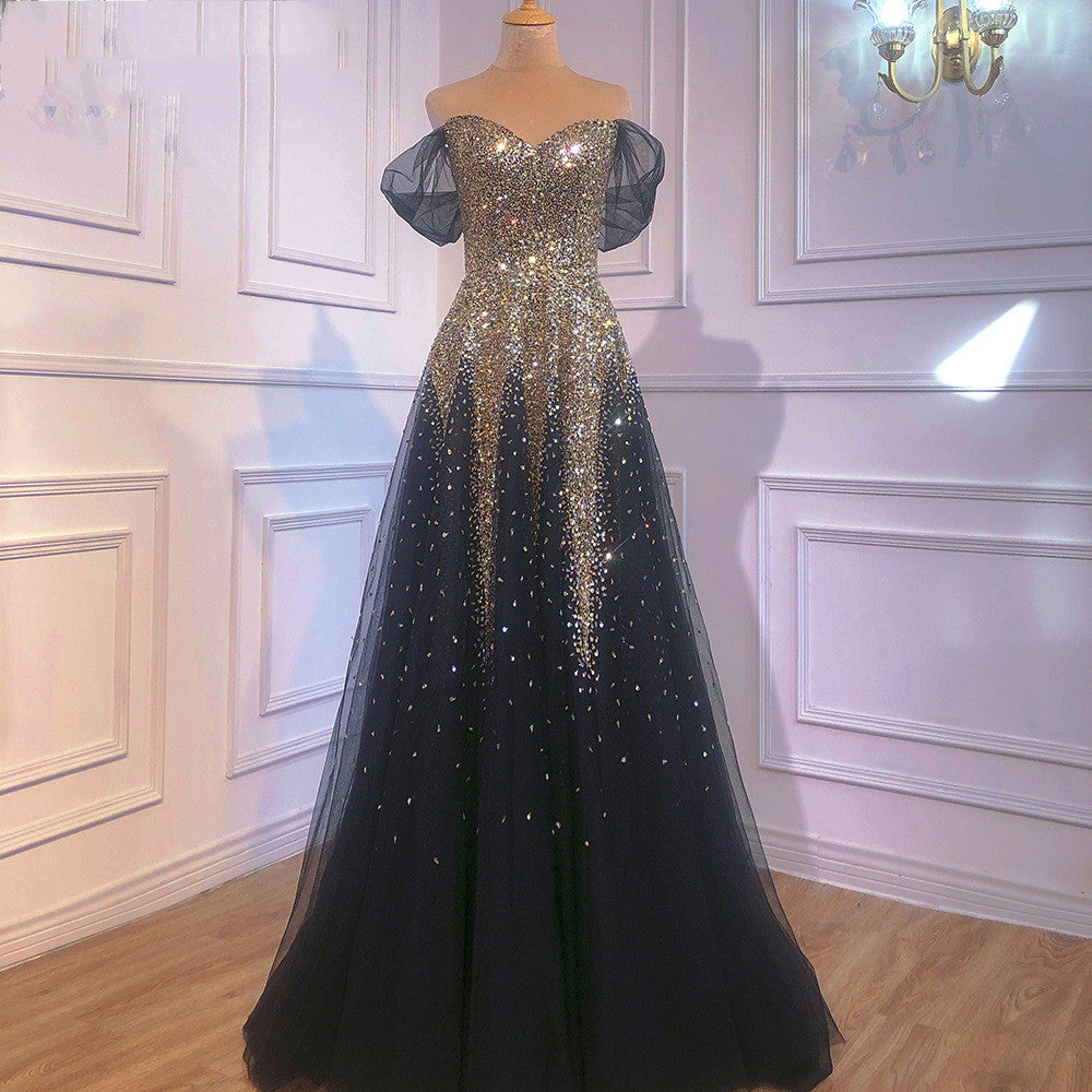 Vestido de noche tostado de novia con banquete de un solo hombro en oro negro