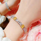 18K Gelbgold Blütenarmband mit Farbigen Diamanten – Eleganz und Luxus