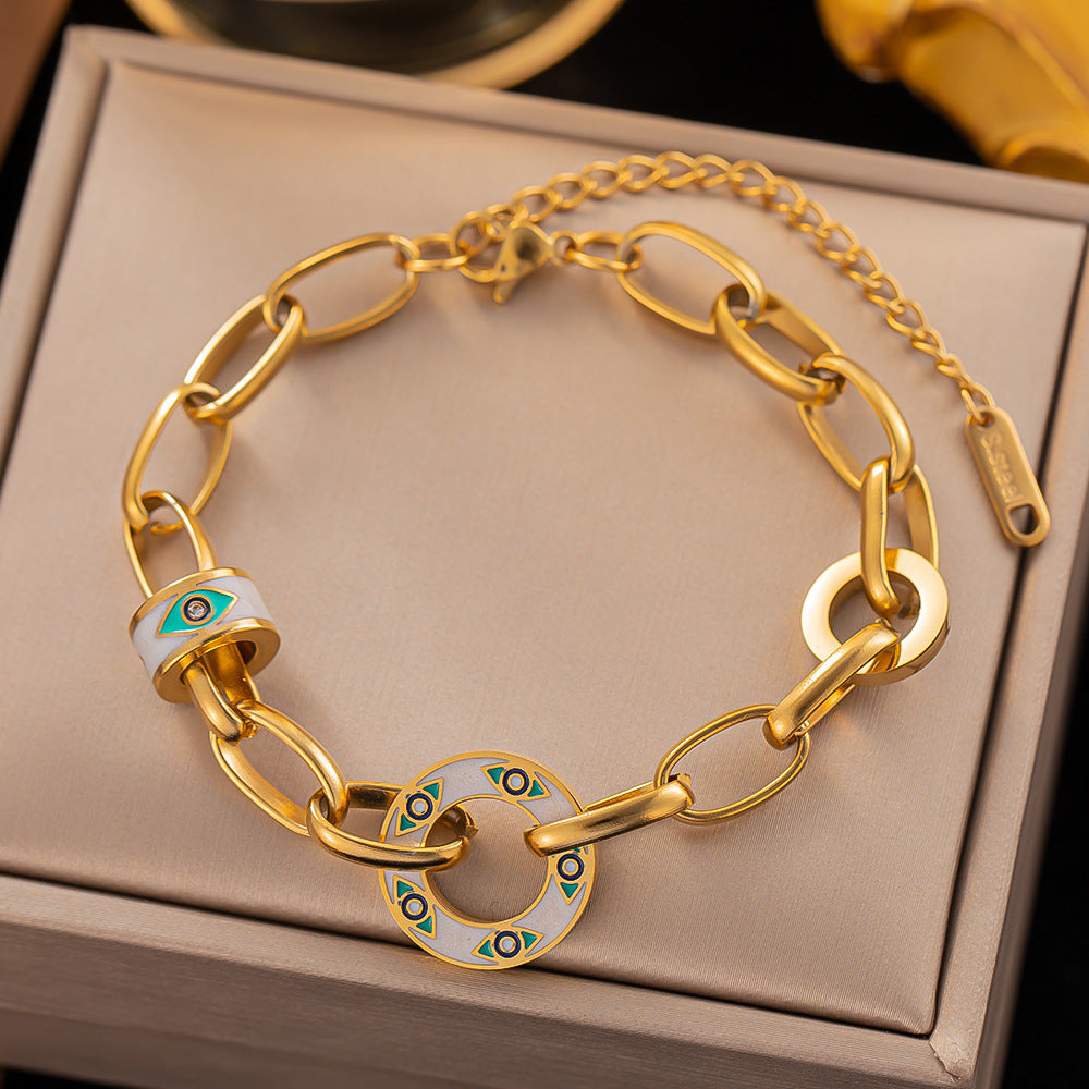 Pulsera de acero de titanio: simple, elegante y chapada en oro con acabado lacado 