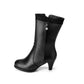 Damenstiefel mit hohem Absatz und Herzanhänger