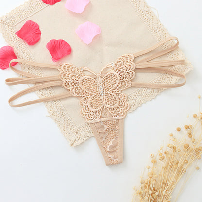 Seductive women's T-back made of delicate lace with cut-outs