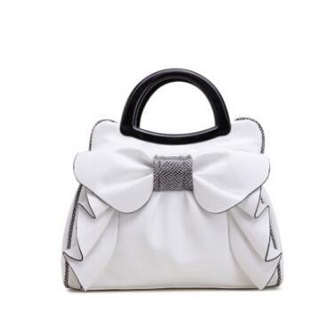 Designer ladies handbag – retro shoulder bag with floral embossing for weddings and special occasions 