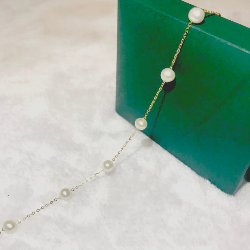 Pulsera de perlas de oro de 18 quilates: elegancia y lujo atemporales 