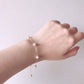 Pulsera de perlas de oro de 18 quilates: elegancia y lujo atemporales 