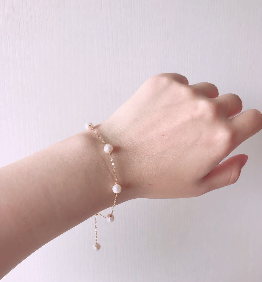 Pulsera de perlas de oro de 18 quilates: elegancia y lujo atemporales 