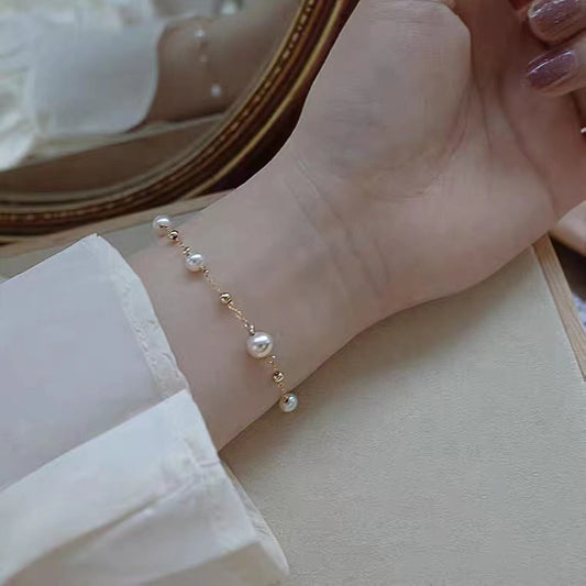 Pulsera de cuentas de estrella de oro de 18 quilates