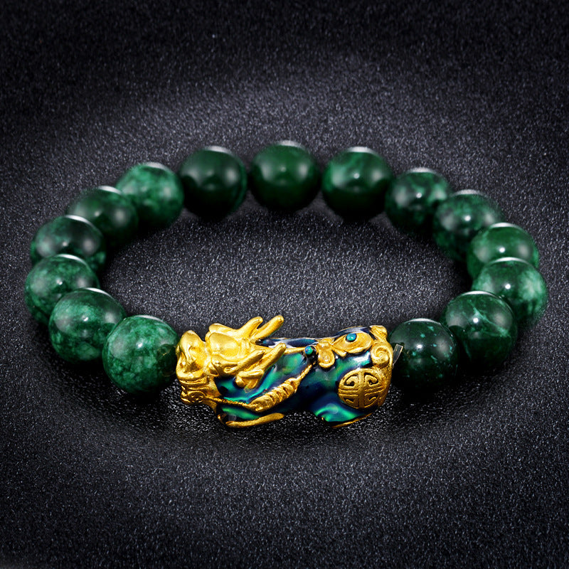 Pulsera camaleón oro arena