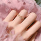 18K Gold Damenring – Krone aus Roségold mit Diamantoptik