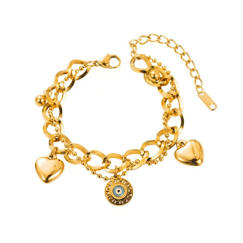 Pulsera de acero de titanio: simple, elegante y chapada en oro con acabado lacado 