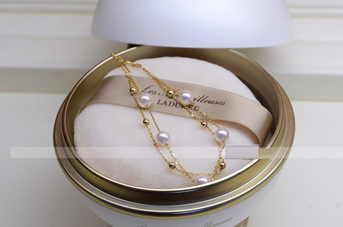 18K Gold Doppellagiges Armband mit Meerwasserperlen – Eleganz in Perfektion