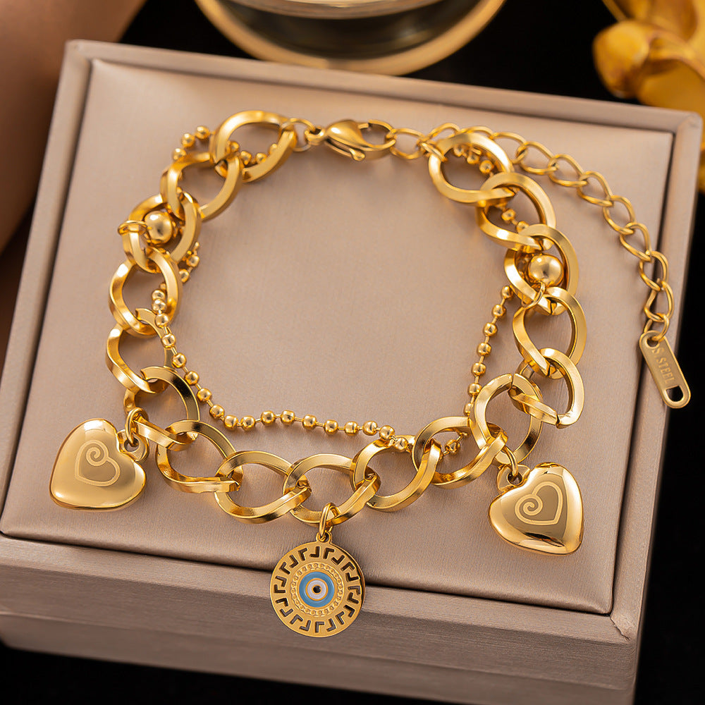Pulsera de acero de titanio: simple, elegante y chapada en oro con acabado lacado 