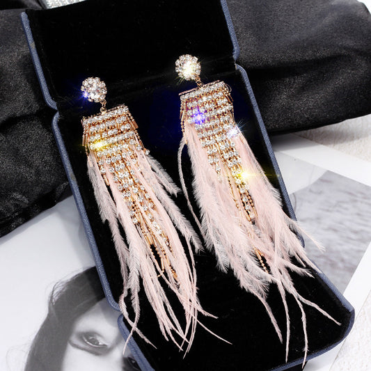 Pendientes de plumas con baño de oro: elegancia con un toque de naturaleza