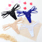Seductive women's T-back made of delicate lace with cut-outs