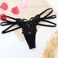 Seductive women's T-back made of delicate lace with cut-outs