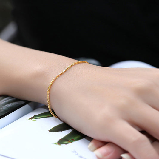 Pulsera de mujer en oro rosa de 18 quilates: elegancia en sencillez 