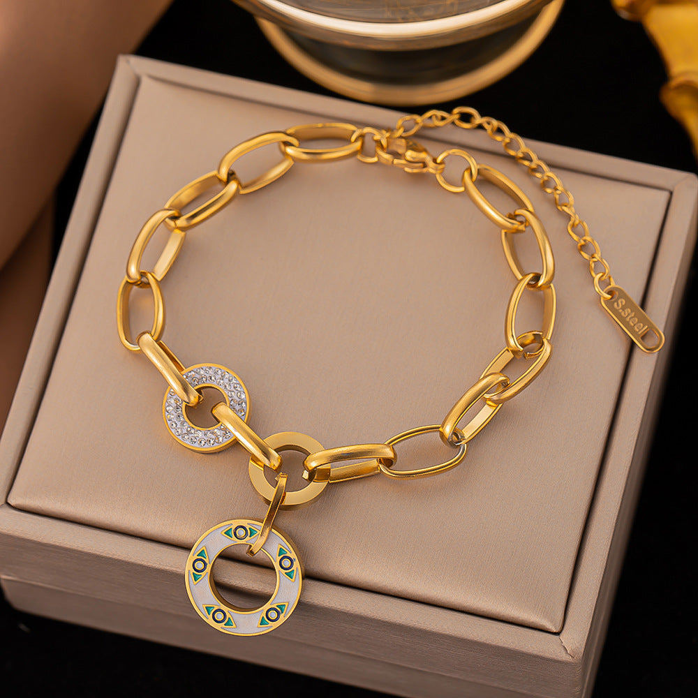 Pulsera de acero de titanio: simple, elegante y chapada en oro con acabado lacado 